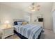 Guest bedroom with a double bed, TV, and ample closet space at 3897 Fairway Dr, North Port, FL 34287