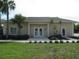 Community building with landscaping and parking at 3897 Fairway Dr, North Port, FL 34287