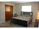 Bright bedroom with a queen-size bed and ample closet space at 4137 Maceachen Blvd, Sarasota, FL 34233