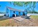 Charming home with a spacious backyard, deck, and patio at 4305 Heyward St, North Port, FL 34291