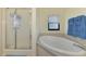 Bathroom with shower, bathtub, and updated vanity at 4305 Heyward St, North Port, FL 34291