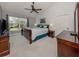 Spacious primary bedroom with ample natural light and room for a king-size bed at 4334 Spicetree St, Venice, FL 34293