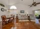 Spacious living room featuring hardwood floors and ample natural light at 4334 Spicetree St, Venice, FL 34293