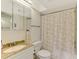 Clean bathroom with shower/tub combo and updated vanity at 4765 Oak Forest W Dr # 47, Sarasota, FL 34231