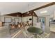Community room featuring tables, chairs, and a kitchenette at 4765 Oak Forest W Dr # 47, Sarasota, FL 34231