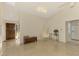 Open living area with tile floors and a hanging chair at 4765 Oak Forest W Dr # 47, Sarasota, FL 34231