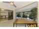 Sunroom with sliding glass doors and view of backyard at 4765 Oak Forest W Dr # 47, Sarasota, FL 34231