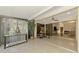 Sunroom with tiled floors, sliding glass doors, and access to backyard at 4765 Oak Forest W Dr # 47, Sarasota, FL 34231