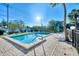 Inviting community pool with lounge chairs at 4765 Oak Forest W Dr # 47, Sarasota, FL 34231