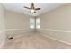 Well-lit bedroom with carpet and ceiling fan at 6255 Aventura Dr, Sarasota, FL 34241