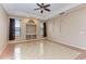 Relaxing living room with neutral tones and built-in shelving at 6255 Aventura Dr, Sarasota, FL 34241