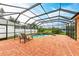 Inviting pool and patio with covered lanai offering shade and relaxation at 6255 Aventura Dr, Sarasota, FL 34241