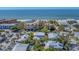 Coastal community aerial view showcasing the proximity to the beach at 6405 Gulf Dr, Holmes Beach, FL 34217