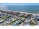 Aerial view of a beach community and home with direct access to the ocean at 6405 Gulf Dr, Holmes Beach, FL 34217