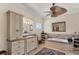 Bathroom featuring a soaking tub, single vanity, and unique decor at 6405 Gulf Dr, Holmes Beach, FL 34217