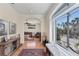 Entry hall with hardwood floors, large windows, and open layout at 6405 Gulf Dr, Holmes Beach, FL 34217