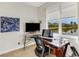 Home office with a view and plenty of workspace at 658 Barnacle Ct, Englewood, FL 34223