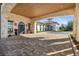 Inviting entrance with stone facade and double doors at 660 Ravello Blvd, Nokomis, FL 34275