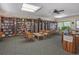 Relaxing library with comfortable seating and books at 694 Bird Bay W Dr # 137, Venice, FL 34285