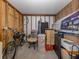 Storage unit with shelving, a bicycle, and various boxes at 694 Bird Bay W Dr # 137, Venice, FL 34285