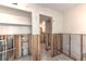 Bathroom under renovation, exposed framing at 902 Gibbs Rd # 183, Venice, FL 34285