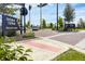 Downtown Wellen Park entrance sign with lush landscaping and brick pavers at 12280 Wellen Golf St # 104, Venice, FL 34293