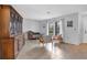 Living room featuring comfortable seating and a large cabinet at 12329 Veronese St, North Port, FL 34287