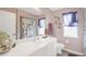 Clean bathroom with white vanity, shower, and updated fixtures at 150 Marker Rd, Rotonda West, FL 33947