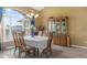 Bright dining room with a large table and a hutch at 150 Marker Rd, Rotonda West, FL 33947