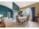 Dining room with a table for six and access to the living room at 150 Marker Rd, Rotonda West, FL 33947