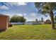 Large backyard with shed and fenced perimeter at 1605 Phillip Pl, Englewood, FL 34223