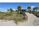 Beach access with boardwalk, stairs and gazebo at 1605 Phillip Pl, Englewood, FL 34223