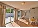 Dining area with sliding glass doors leading to the backyard at 1605 Phillip Pl, Englewood, FL 34223
