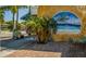 Building exterior with beach mural and walkway at 1605 Phillip Pl, Englewood, FL 34223