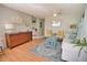 Open living room showcasing hardwood floors, and stylish furniture at 1605 Phillip Pl, Englewood, FL 34223