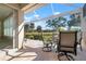 Relaxing patio with seating area, overlooking a golf course at 1767 San Silvestro Dr, Venice, FL 34285