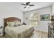 Serene bedroom with a queen-size bed and large window at 19303 Jacinda St, Venice, FL 34293