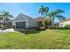 Single-story house with a tile roof and paver driveway at 19357 Jacinda St, Venice, FL 34293