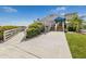Community clubhouse with deck and stairs leading to entrance at 218 Trailorama Dr, North Port, FL 34287