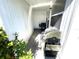 Covered patio with grill and storage space at 218 Trailorama Dr, North Port, FL 34287