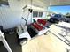 White golf cart with red seats at 218 Trailorama Dr, North Port, FL 34287