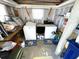 Shared laundry with washer and dryer hookups at 218 Trailorama Dr, North Port, FL 34287
