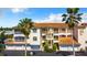 Attractive condo building with tile roofs and garages at 235 Base E Ave # 201, Venice, FL 34285