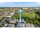 Expansive aerial view of Venice, Florida, featuring the water tower, coastline, and picturesque landscape at 250 Santa Maria St # 219, Venice, FL 34285