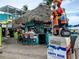 Beachfront bar with thatch roof and pirate statue at 250 Santa Maria St # 219, Venice, FL 34285