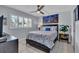 Guest bedroom with coastal decor and ceiling fan at 250 Santa Maria St # 219, Venice, FL 34285
