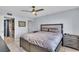 Spacious bedroom with closet and ceiling fan at 250 Santa Maria St # 219, Venice, FL 34285