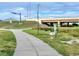 Scenic walkway underpass leading towards a bridge, showcasing the area's natural landscape and infrastructure at 250 Santa Maria St # 219, Venice, FL 34285