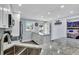 Modern kitchen with island, stainless steel appliances, and granite counters at 250 Santa Maria St # 219, Venice, FL 34285