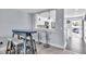 Open kitchen with breakfast bar and modern finishes at 250 Santa Maria St # 219, Venice, FL 34285